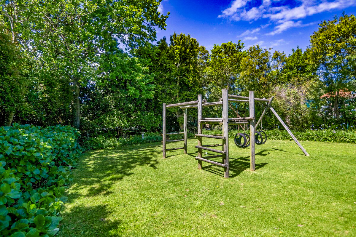 Modern mid-term rental living room in Western Cape with workspace